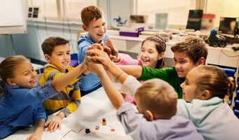 children in school all shaking hands, tips to get involved in school pta